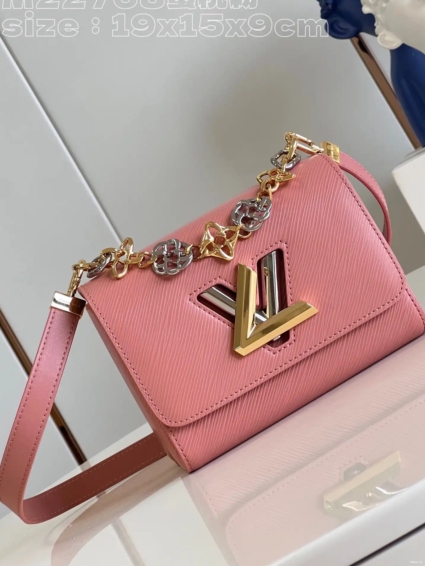 VUITTON TWIST LOUIS PM 0623